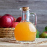 a bottle of raw unfiltered apple cider vinegar _ - Why apple cider vinegar is good for humans?