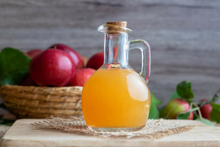 a bottle of raw unfiltered apple cider vinegar _ - Why apple cider vinegar is good for humans?