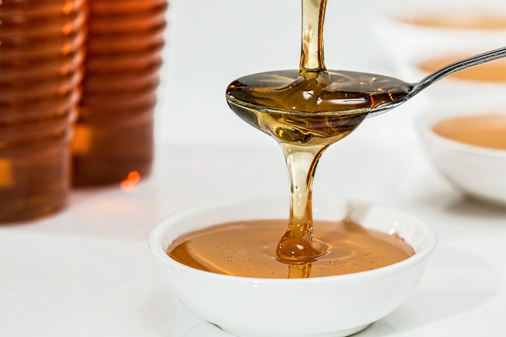 honey on white bowl - Keto sugar substitutes: 7 things you need to know