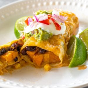 TheGirlWhoAteEverything_SweetPotatoAndBlackBeanEnchiladas_Hero _Vertical - Sweet Potato and Black Bean Enchiladas