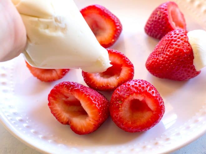 hollowed out strawberries with cream