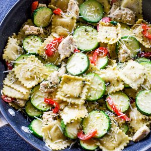 Pesto Ravioli with Chicken - a dinner ready in less than 25 minutes. Packed with flavor! the-girl-who-ate-everything.com