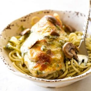 Pesto Chicken - you'll never believe how easy this delicious dinner is! the-girl-who-ate-everything.com