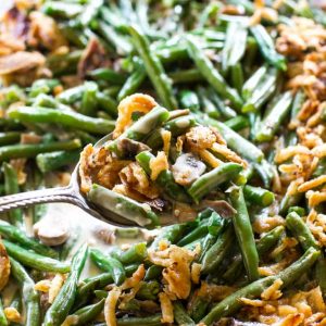 This homemade Green Bean Casserole recipe made without cream of mushroom soup. Easy and delicious side for Thanksgiving or any other holiday. the-girl-who-ate-everything.com