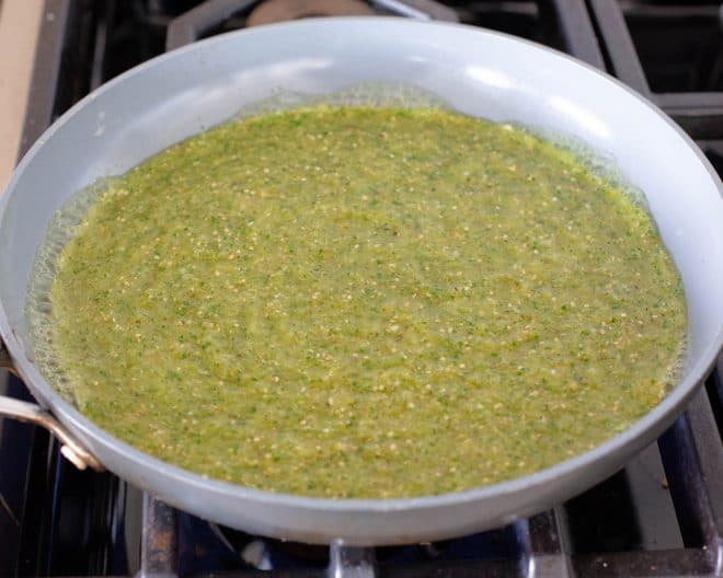 salsa verde cooking in a pan