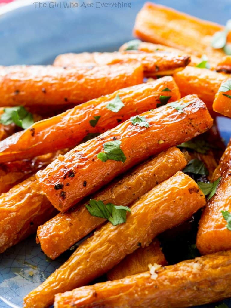 These Perfectly Roasted Carrots that have caramelized edges and are tender enough to eat without being mushy. This is a great side dish! the-girl-who-ate-everything.com