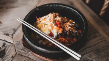 a bee oo ti full kimchi bowl at a local japanese restaurant food was stone bowl was litty committee for the city metal chop sticks were a ok ok yes the kimchi was fire id fasho order again ins stockpack unsplash scaled - Keto-Friendly Spicy Chicken Bowls – Perfect for Low-Carb Meal Prep
