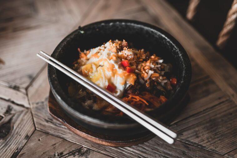 a bee oo ti full kimchi bowl at a local japanese restaurant food was stone bowl was litty committee for the city metal chop sticks were a ok ok yes the kimchi was fire id fasho order again ins stockpack unsplash scaled - Keto-Friendly Spicy Chicken Bowls – Perfect for Low-Carb Meal Prep
