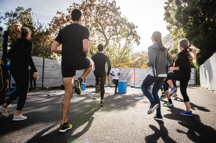 man in black t shirt and black shorts running on road during daytime stockpack unsplash scaled - The Benefits of Leading a Healthy Lifestyle