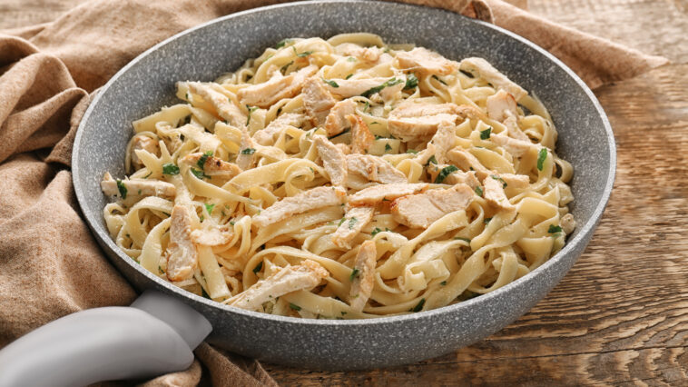 Frying pan with chicken Alfredo