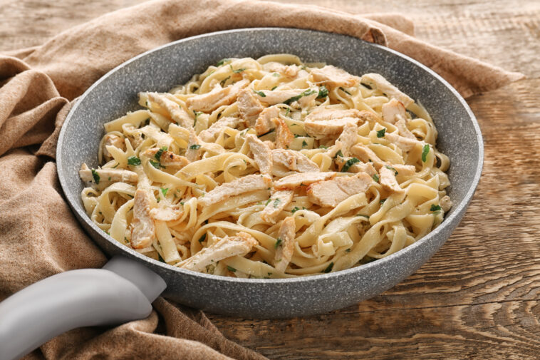 Frying pan with chicken Alfredo