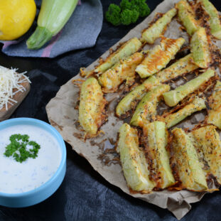 Keto Diet Zucchini Fries on background, close up