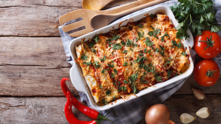 Mexican enchilada in a baking dish horizontal top view