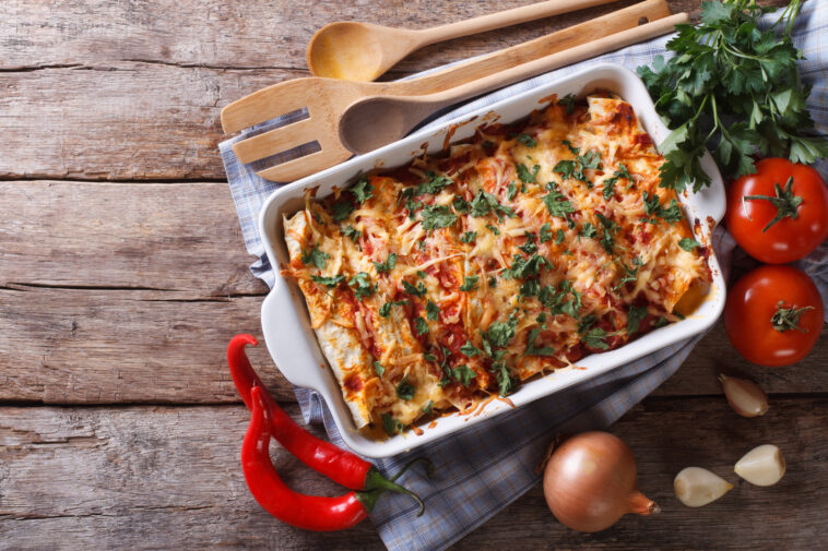 Mexican enchilada in a baking dish horizontal top view