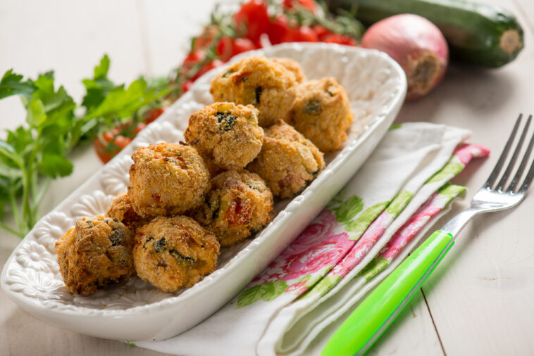 vegetarian meat ball with rice zucchinis and tomatoes