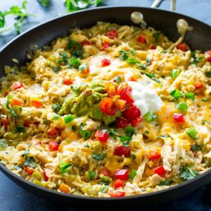 One-Pan Chicken Fajita Rice - an easy Mexican dinner read in under 30 minutes. the-girl-who-ate-everything.com