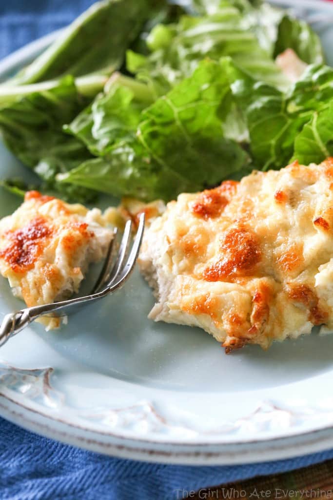 This Artichoke Chicken is a simple and easy meal that is delicious! It tastes like artichoke dip on top of chicken. the-girl-who-ate-everything.com