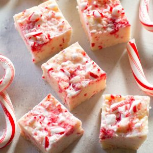 Candy Cane Fudge - only 5 ingredients and so delicious. the-girl-who-ate-everything.com